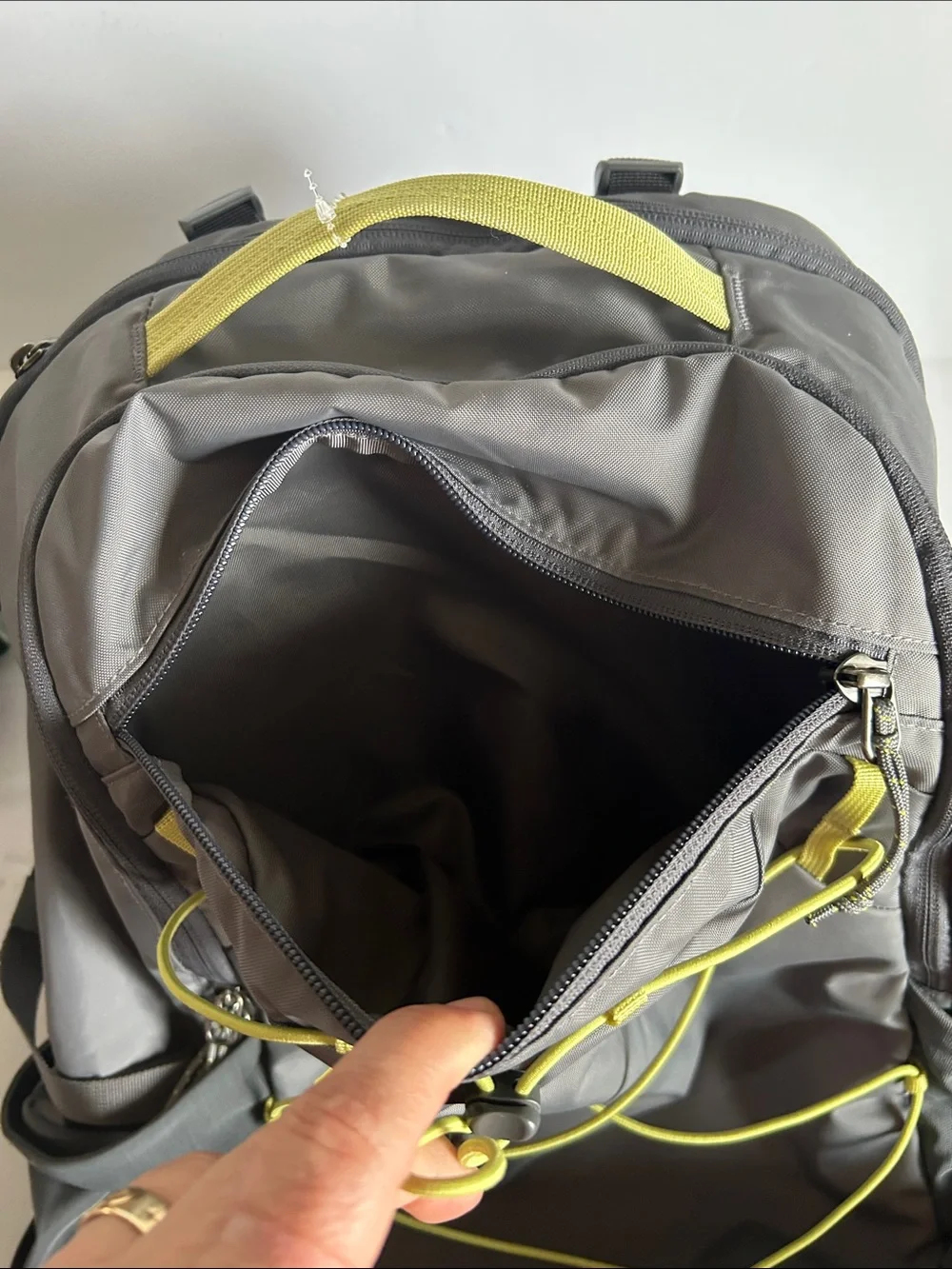 Patagonia Gray Backpack with Yellow Bungee Accents